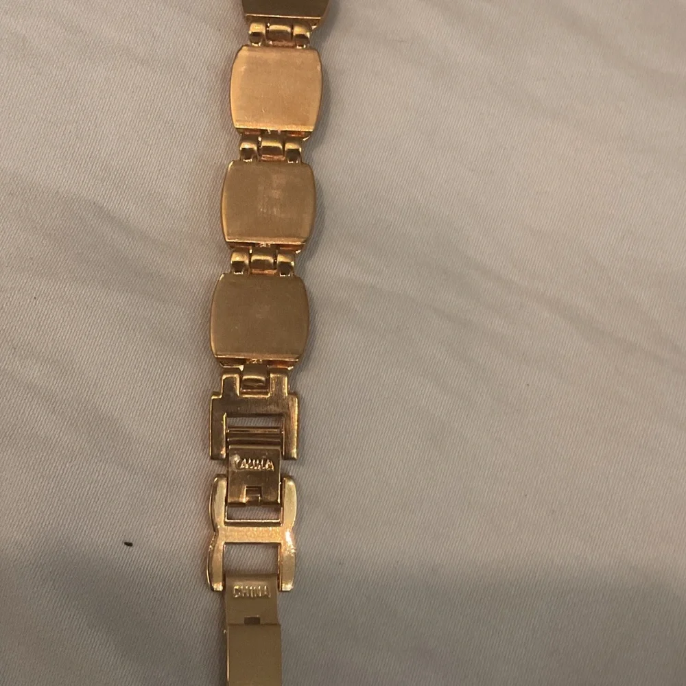 Elegant Gold and Black Women's Watch